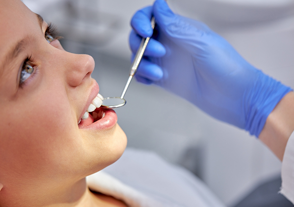 Woman receiving a dental exam