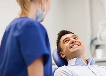 Smiling man in dental chair