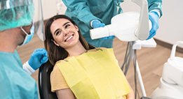 Woman smiling at her dentist