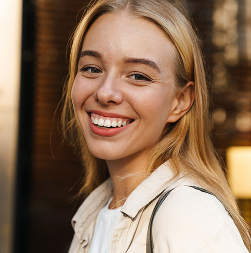 Young blonde woman smiling