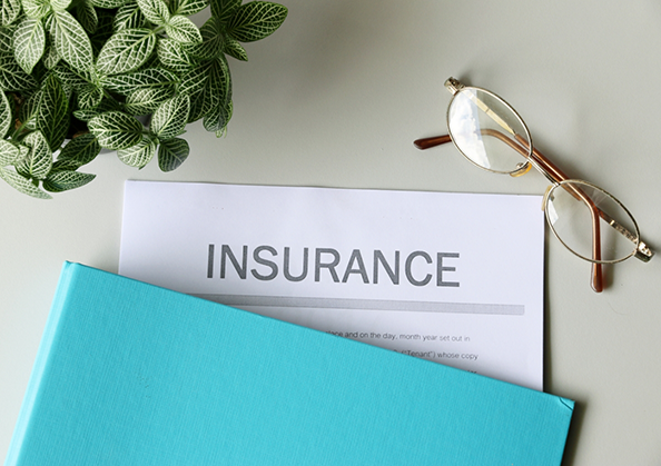 Insurance paperwork on a table
